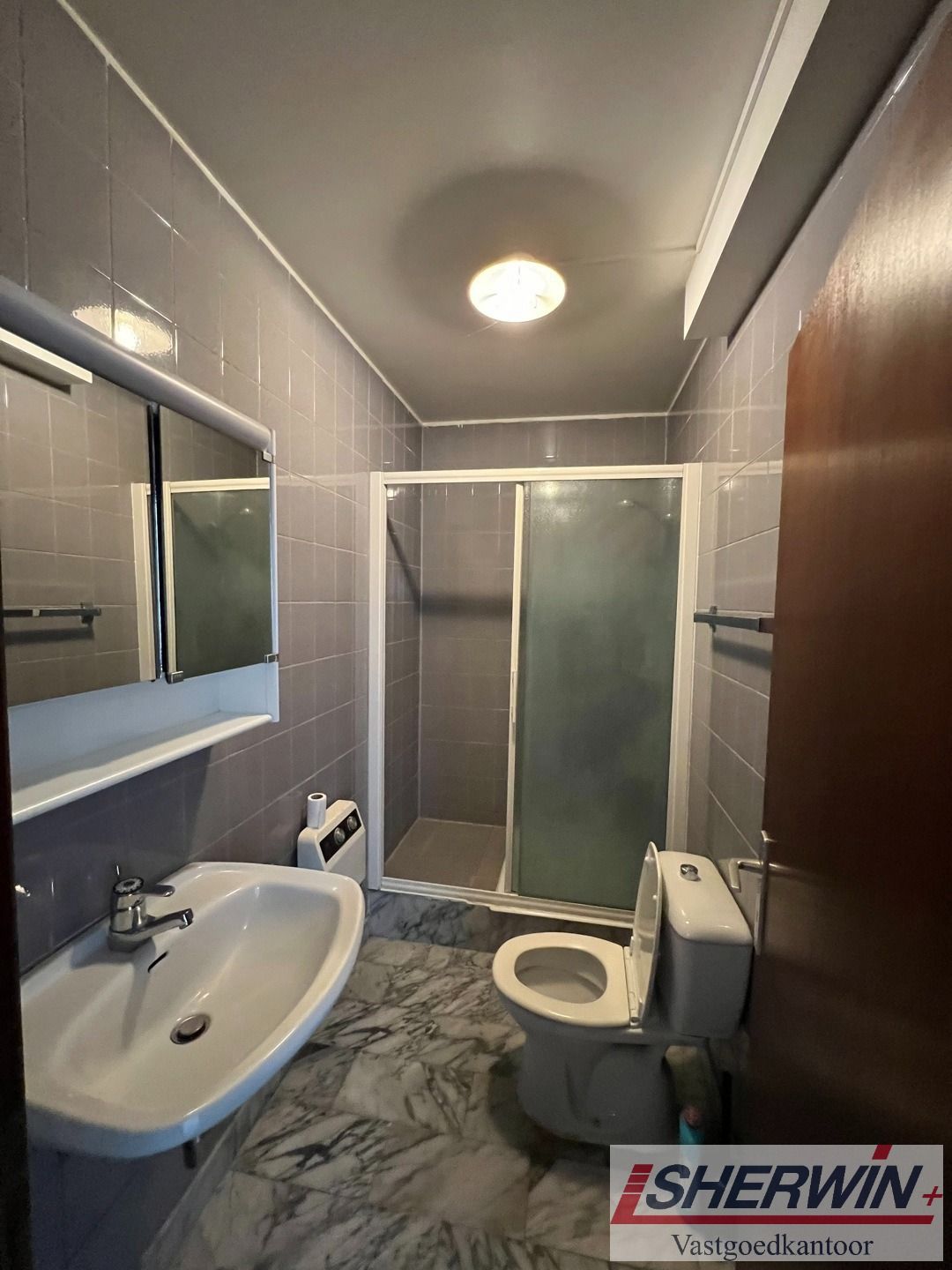 Deel van zeer goed gelegen appartementsgebouw in centrum foto 29