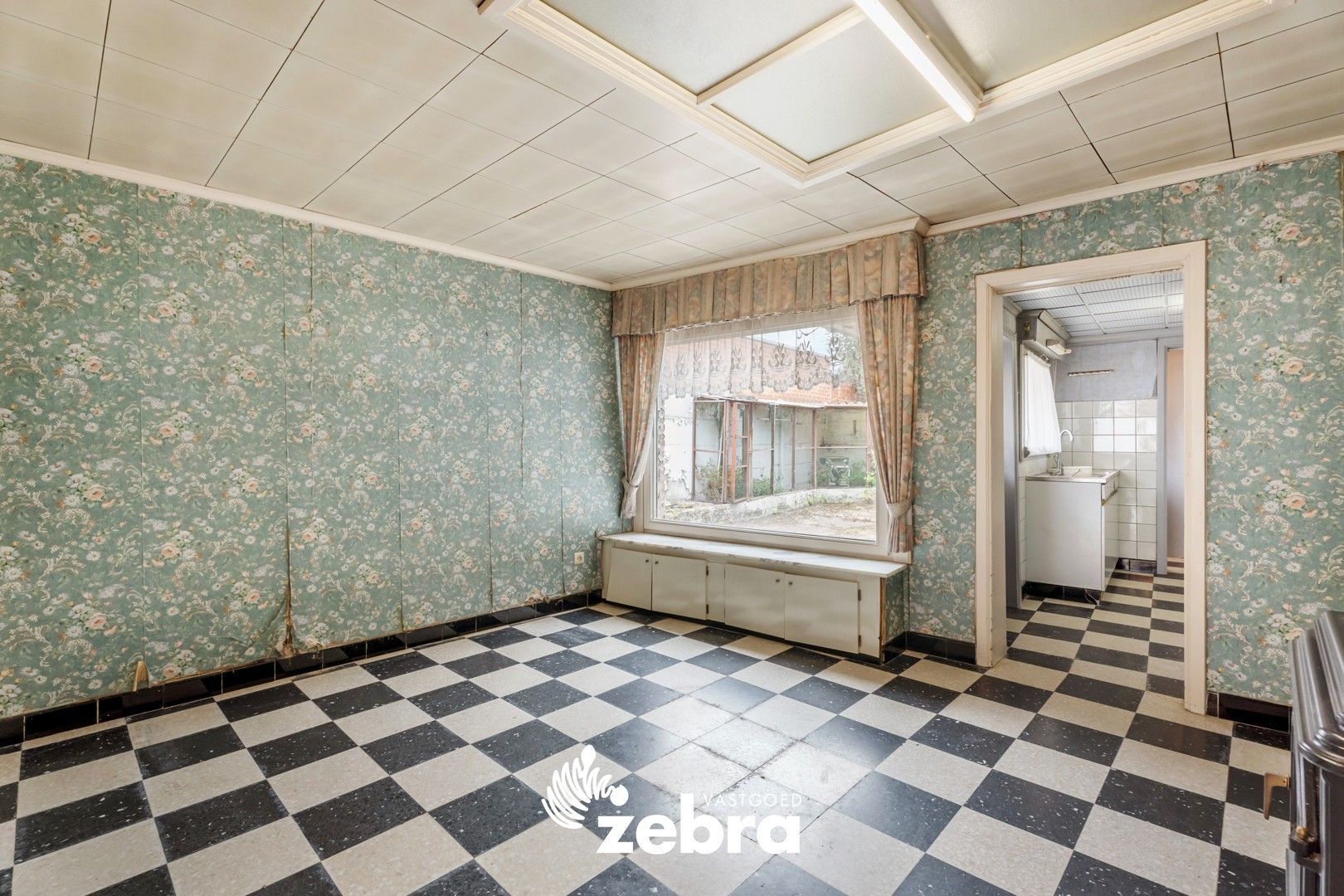 Te renoveren woning met 3 slaapkamers te Oostrozebeke! foto 7