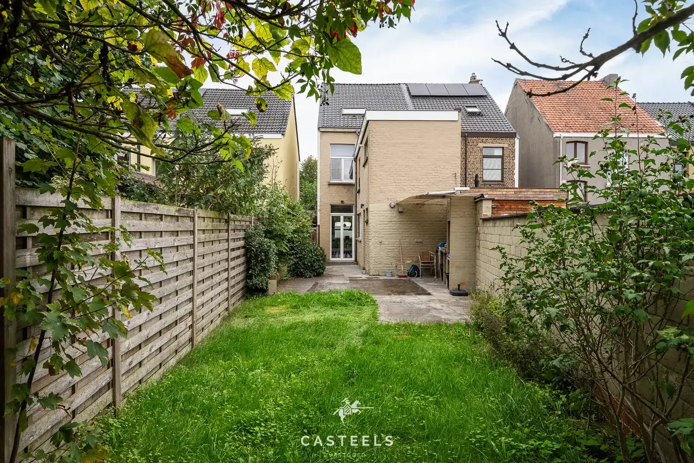 Centraal gelegen rijwoning met tuin in Sint-Denijs-Westrem foto 4