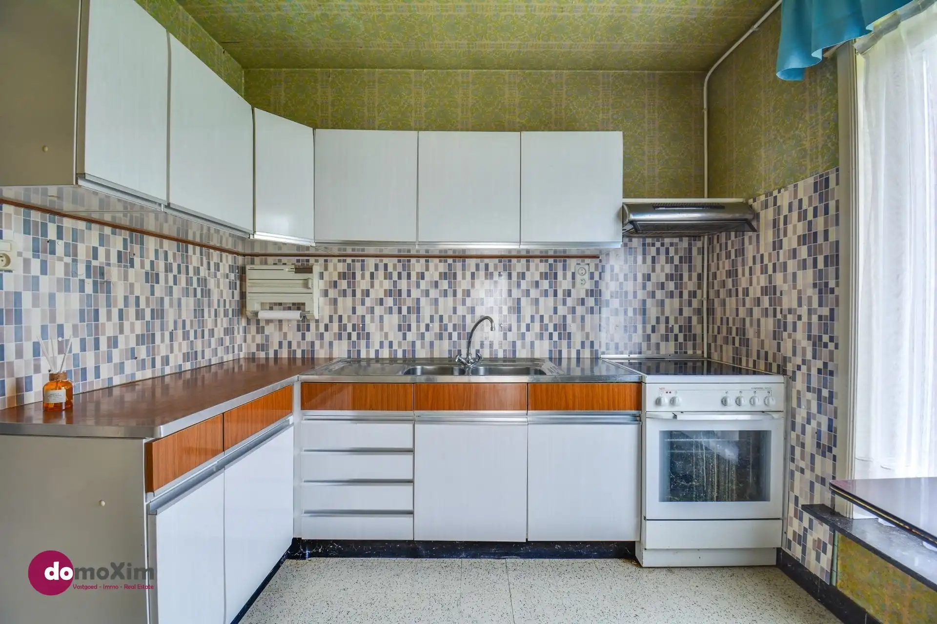 Te renoveren woning met garage in Boortmeerbeek foto 8