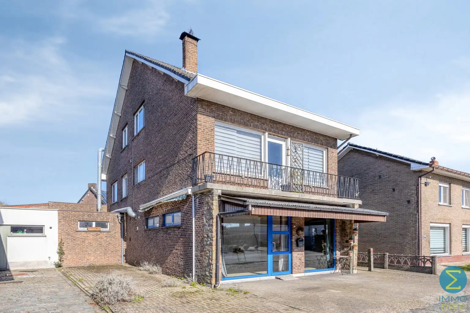 Woning met gelijkvloerse handelsruimte nabij het centrum foto 2