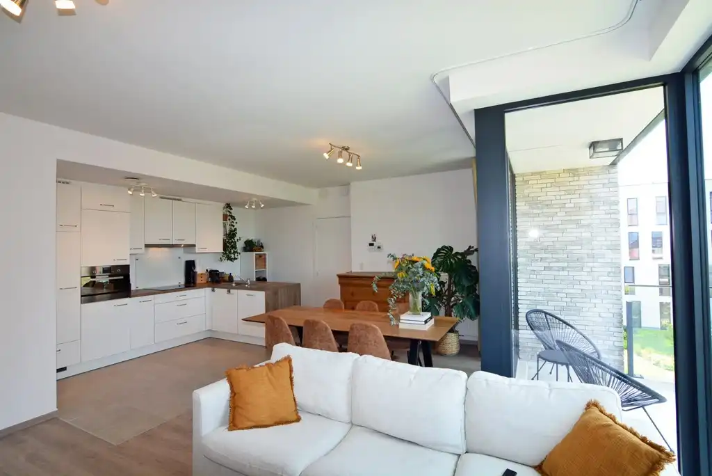 Modern, energiezuinig appartement met 2 slpks, terras, autostaanplaats en kelderberging. foto 5