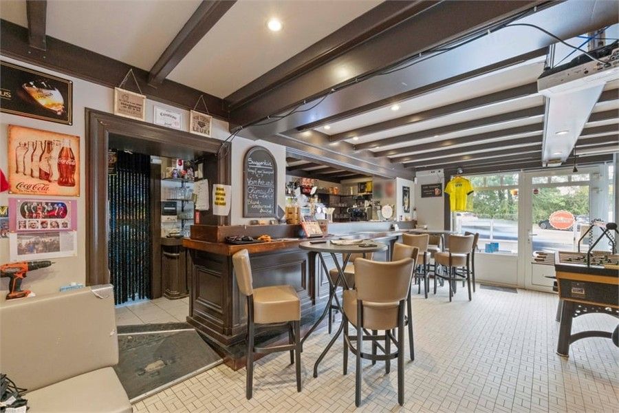 HANDELSHUIS MET PARKING OP EEN TOPLOCATIE IN LINTER foto 8