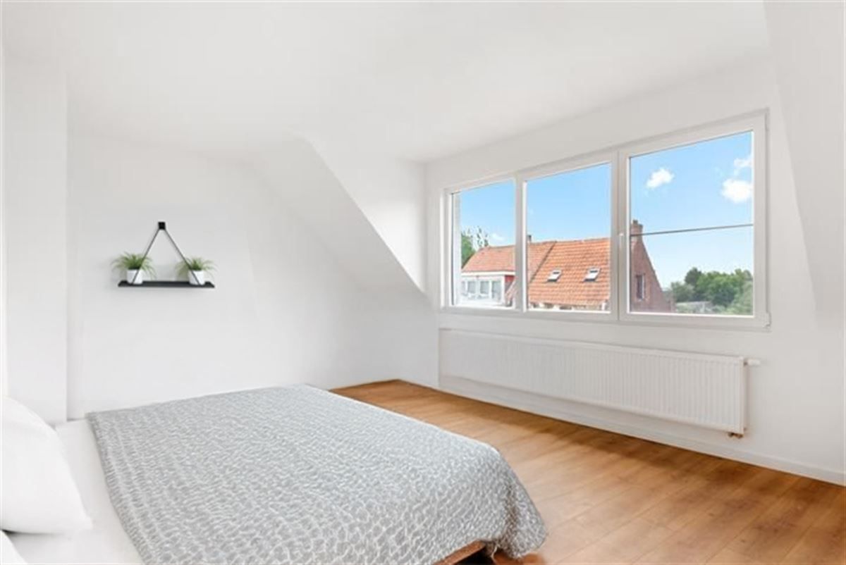 Lichte woning met diepe tuin foto 19