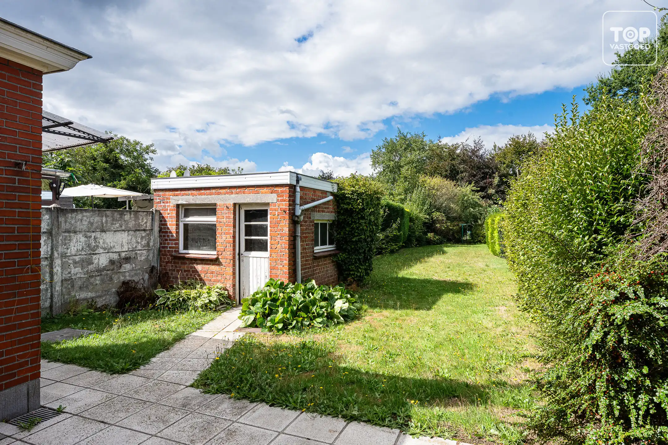 Te renoveren halfopen bebouwing met 3 slaapkamers, garage en ruime tuin op perceel van +-600 m² foto 22
