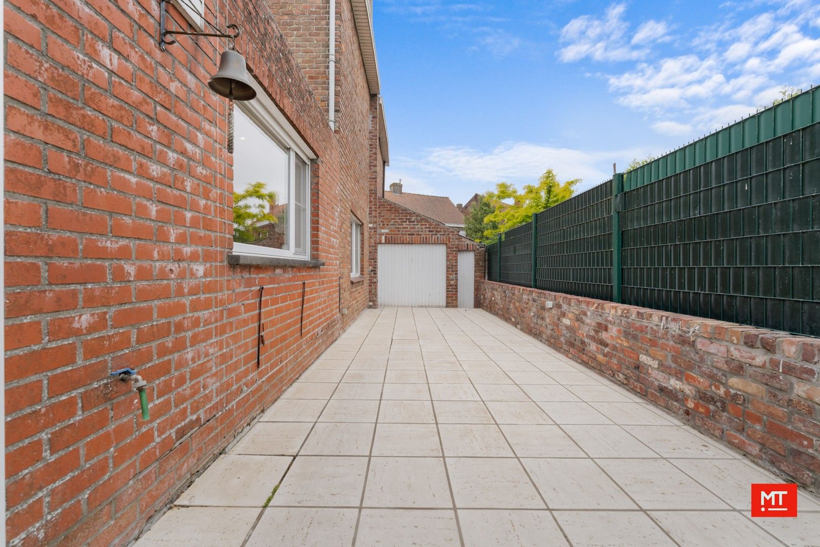 Op te frissen woning met 2 slpk (+ mogelijk), tuin en garage in het landelijke Mesen foto 17