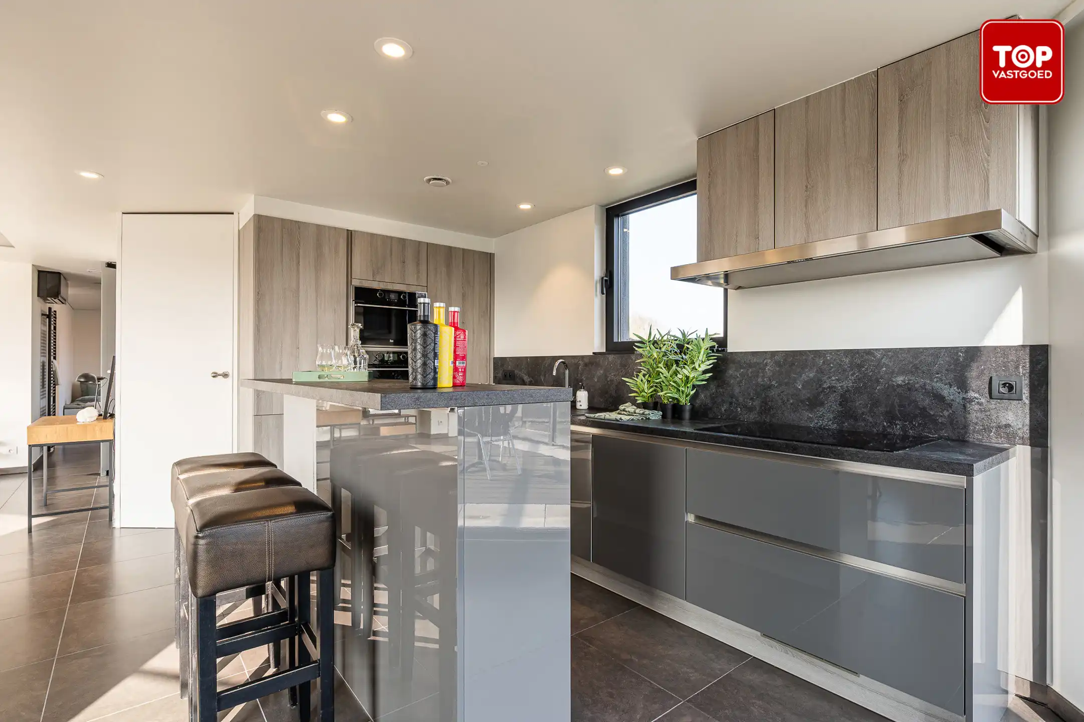 Energiezuinige en lichtrijke penthouse met 3 terrassen en prachtig uitzicht foto 11