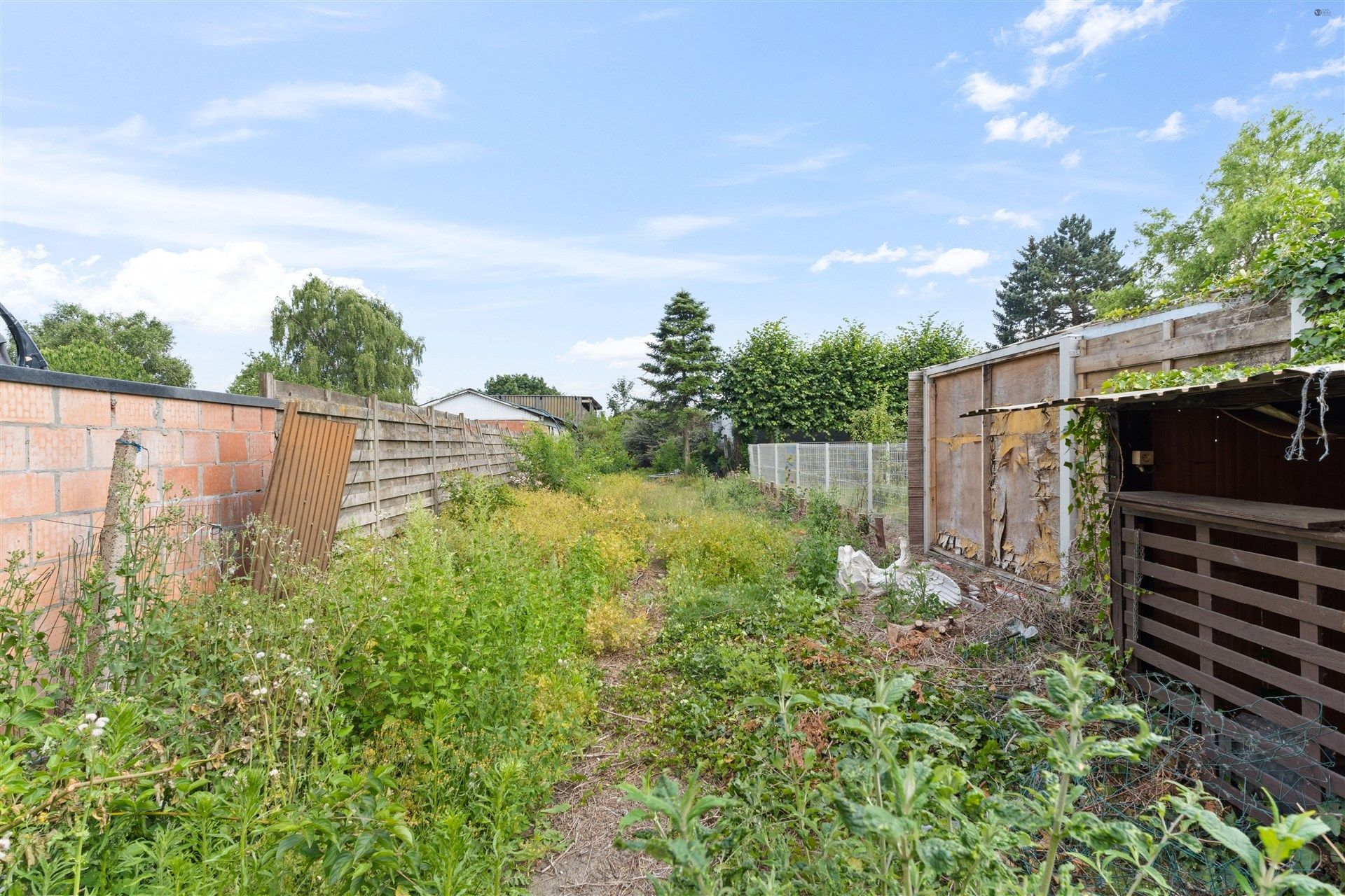 op te knappen woning op 540m² grond  foto 15