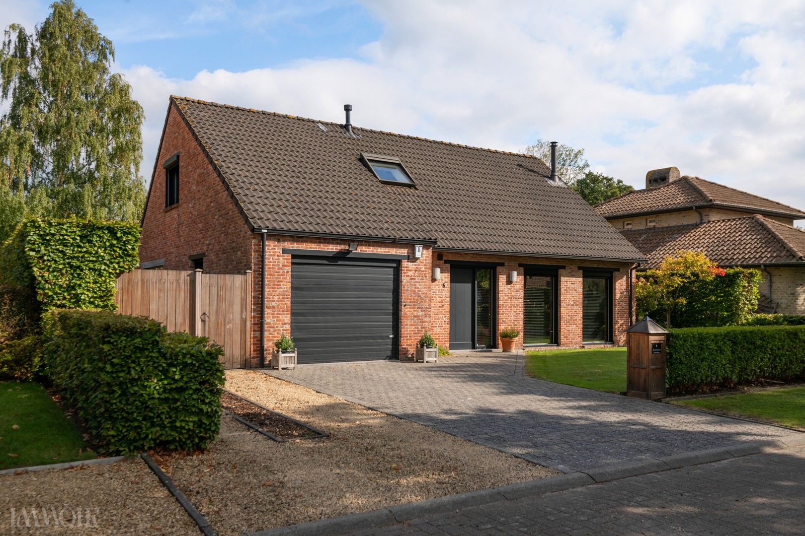 Charmante, instapklare villa in de geliefde Amerlo-wijk in Schoten. foto {{pictureIndex}}