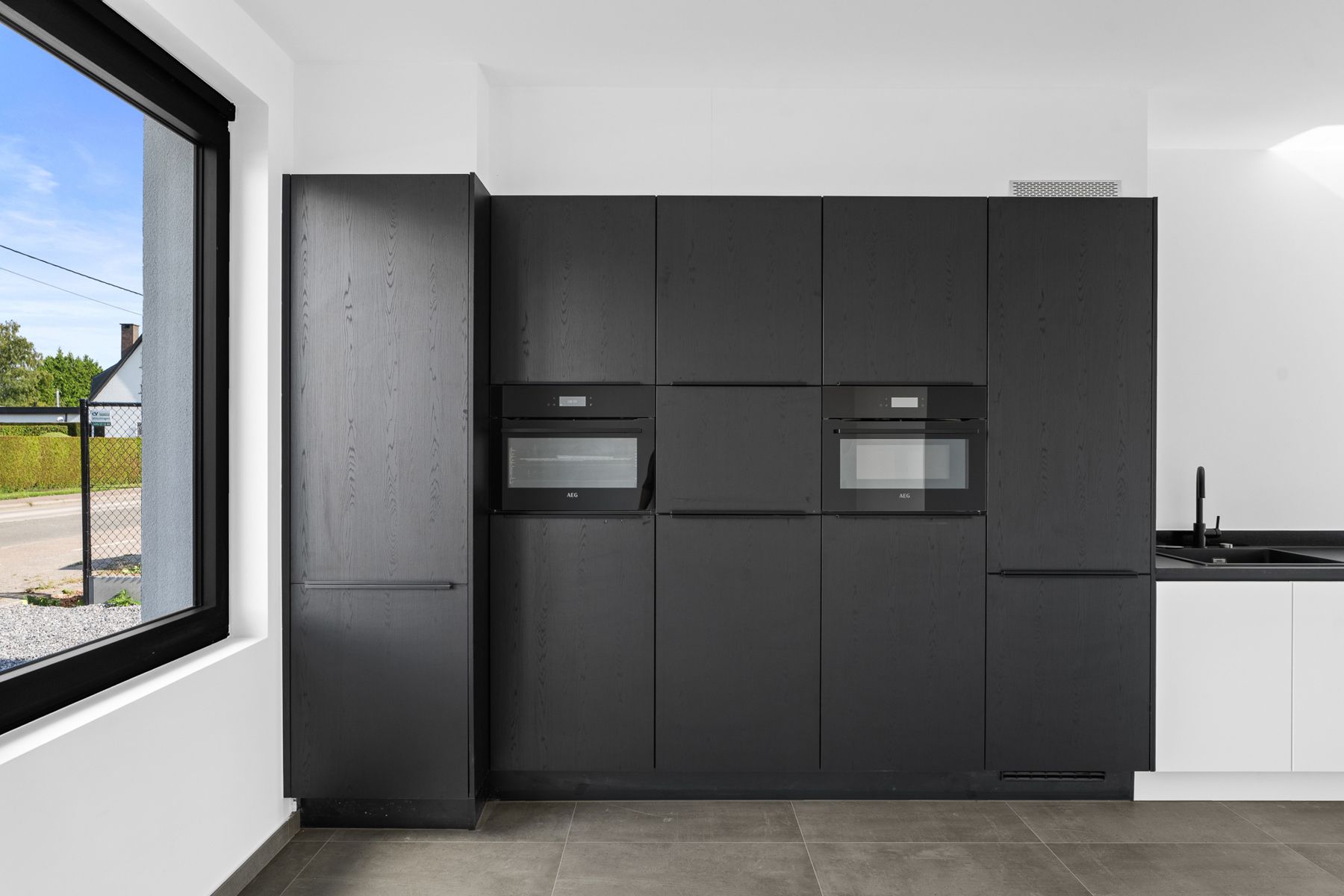 Modern comfort in een tijdloze halfopen bebouwing foto 11