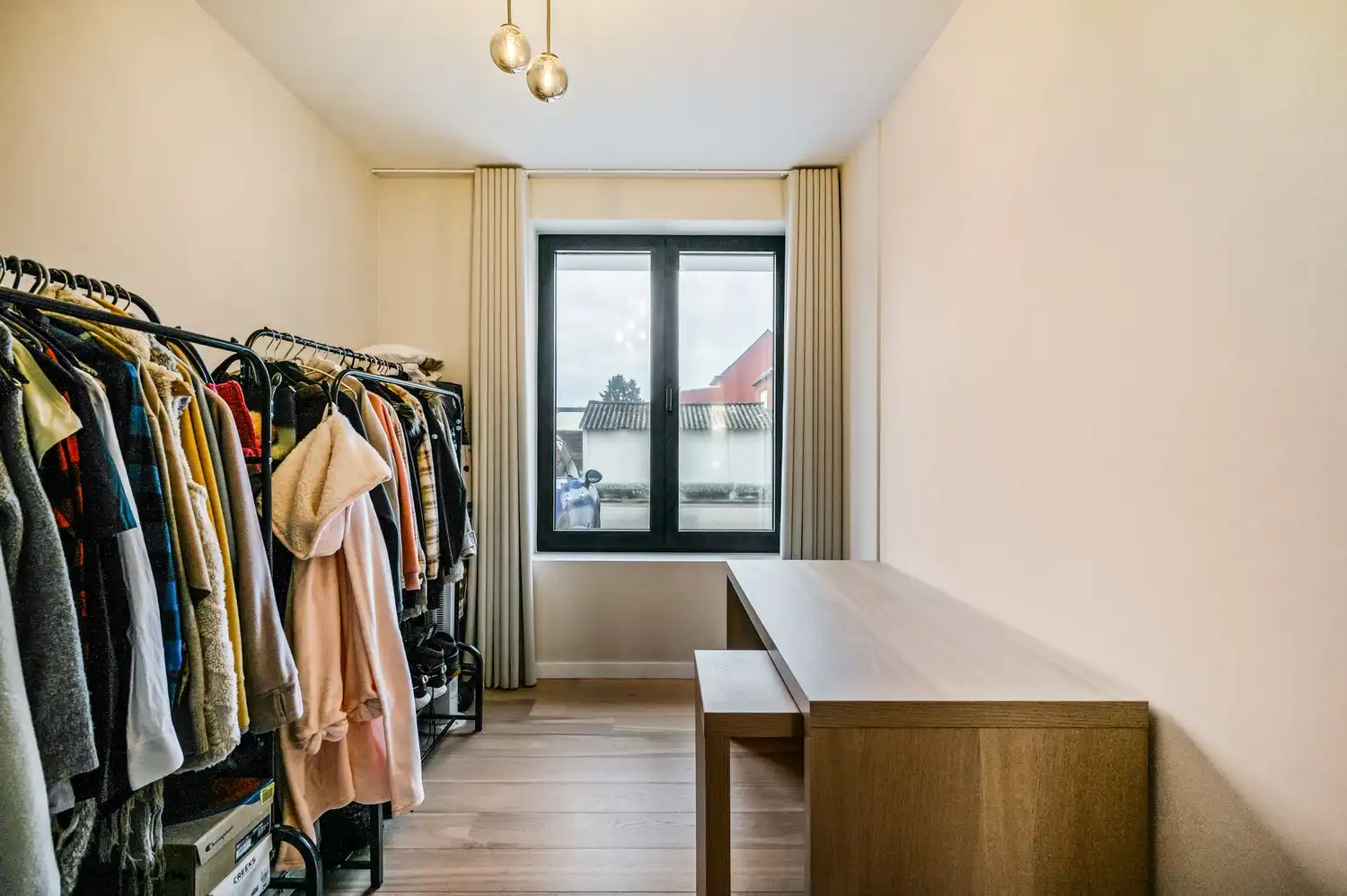 Gelijkvloers energiezuinig app. met 2 slpkrs, 2 terrassen en garagebox foto 11