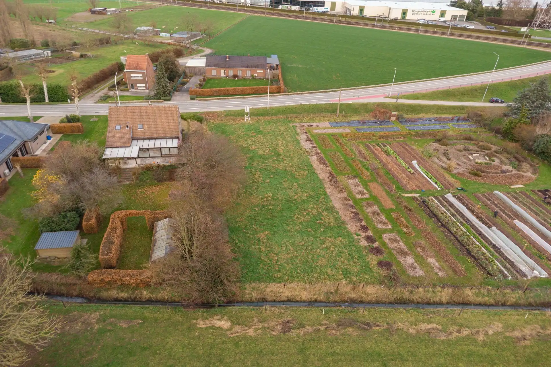 Perceel villagrond van 1083m2 & ZUID-tuin foto 6