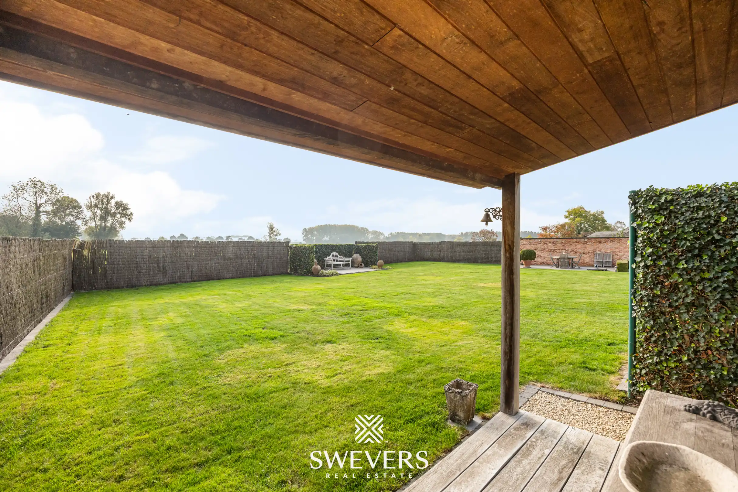 Sfeervolle open bebouwing met royale tuin en veel privacy foto 29