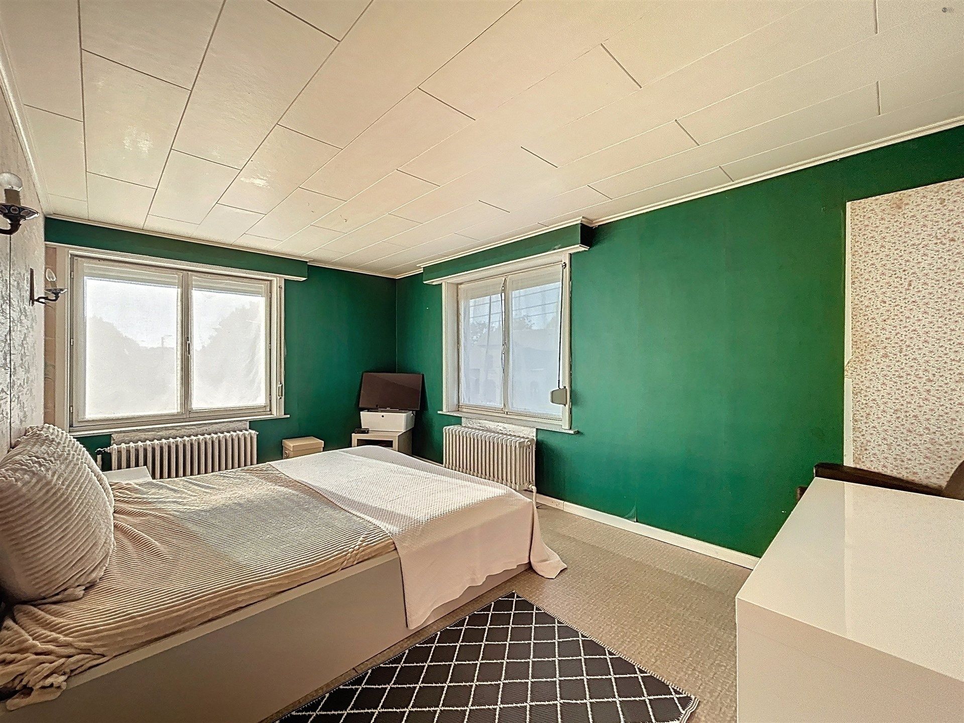 Charmante te renoveren woning op prachtig perceel van 1100m². foto 11