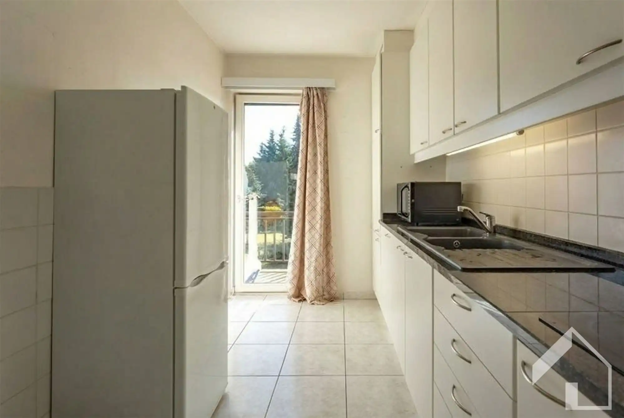 Appartement met 2 slaapkamers, terras, gemeenschappelijke tuin en lift. Optioneel Garagebox foto 4