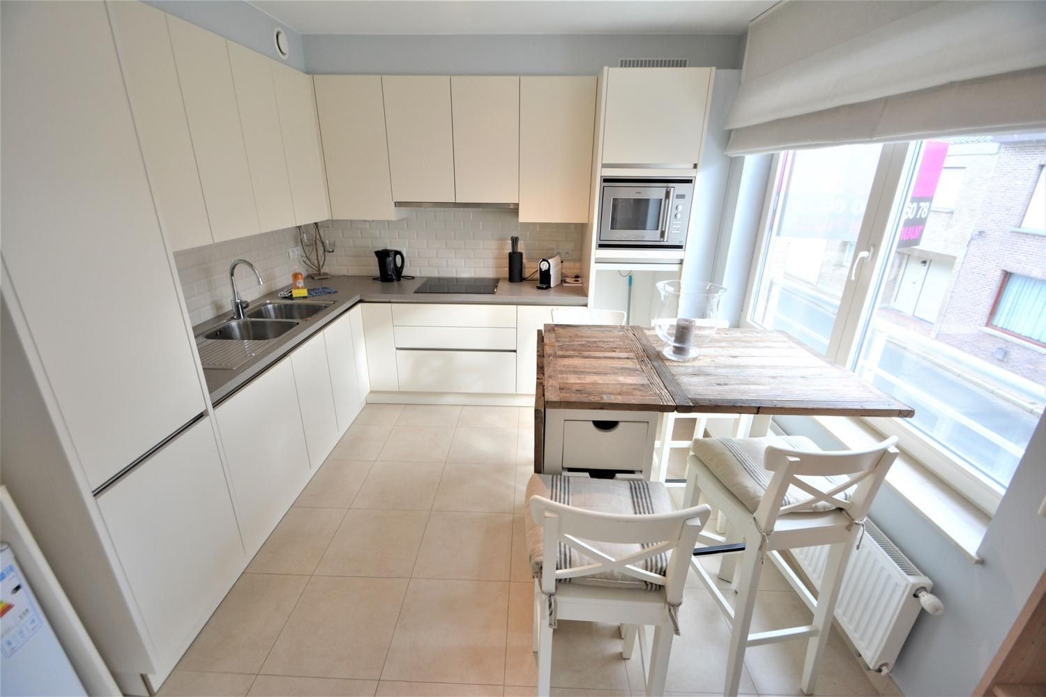 Ruime kangoeroewoning met tuin, terras en garage in Knokke, bouwjaar 1963, 3 slaapkamers, EPC-waarde 183.00, 2 badkamers, perceeloppervlakte 125.00, bewoonbare  foto 10