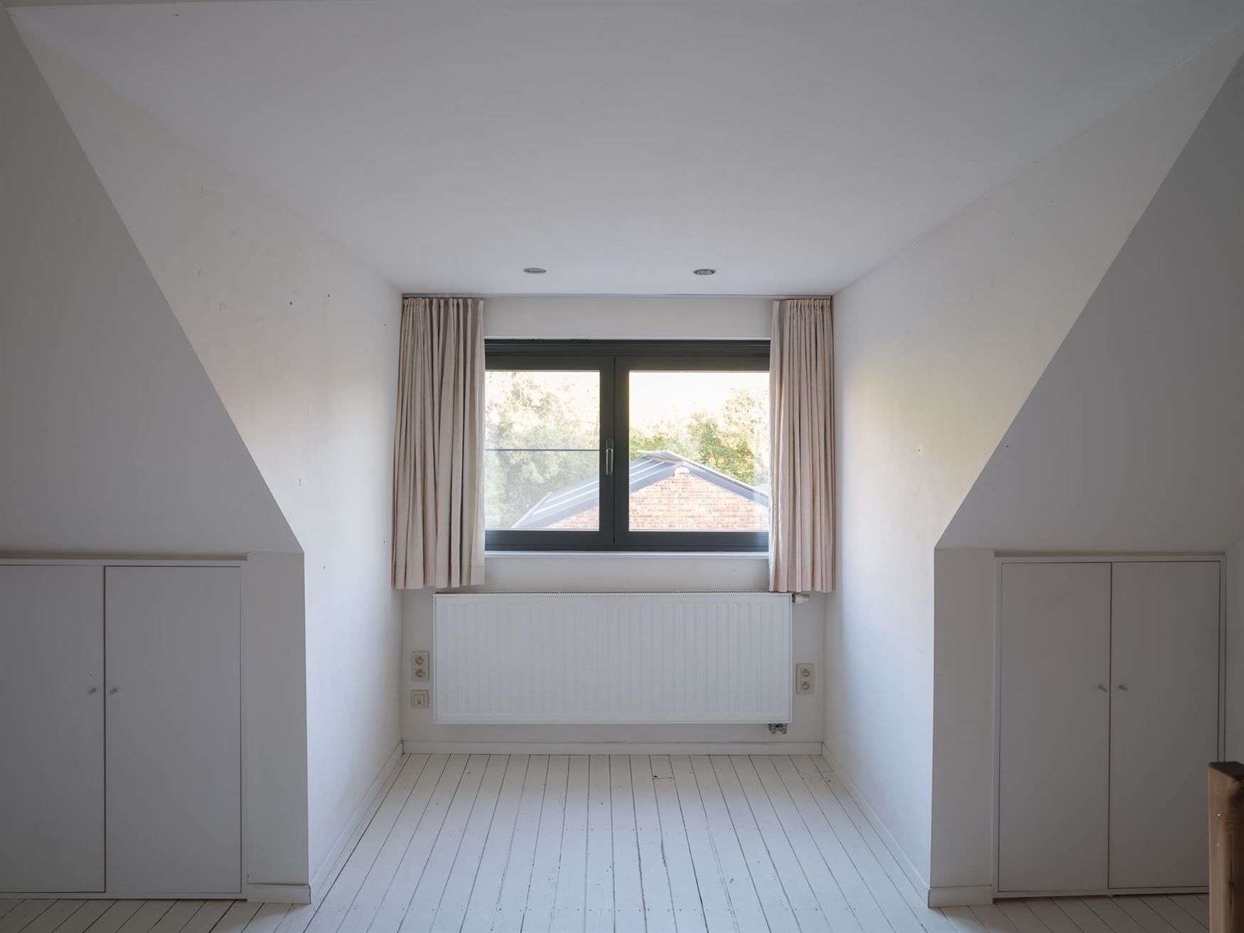 Instapklare, lichtrijke woning in gegeerde wijk te Gent foto 15