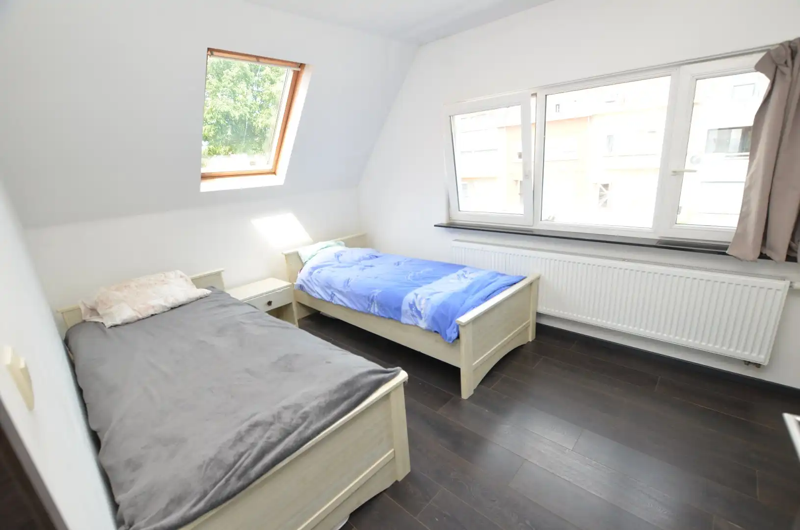 Mooi gelegen gerenoveerde half-open bebouwing (Kangoeroewoning) foto 9