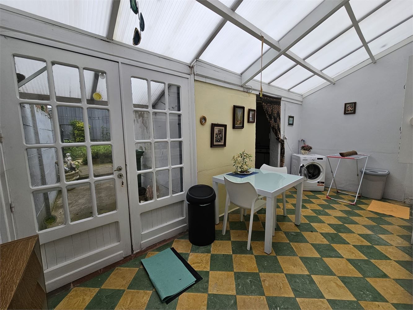 Te renoveren woning met tuin in het centrum van Moerbeke foto 6
