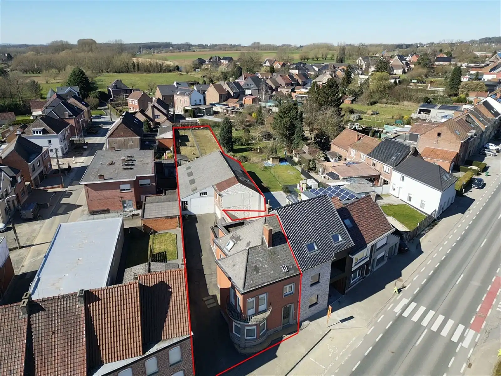 3 gevelwoning met loods (248m2) en garage foto 3