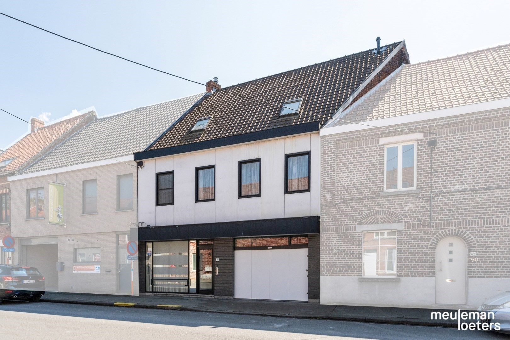 Commercieel pand met ruime woning foto 1