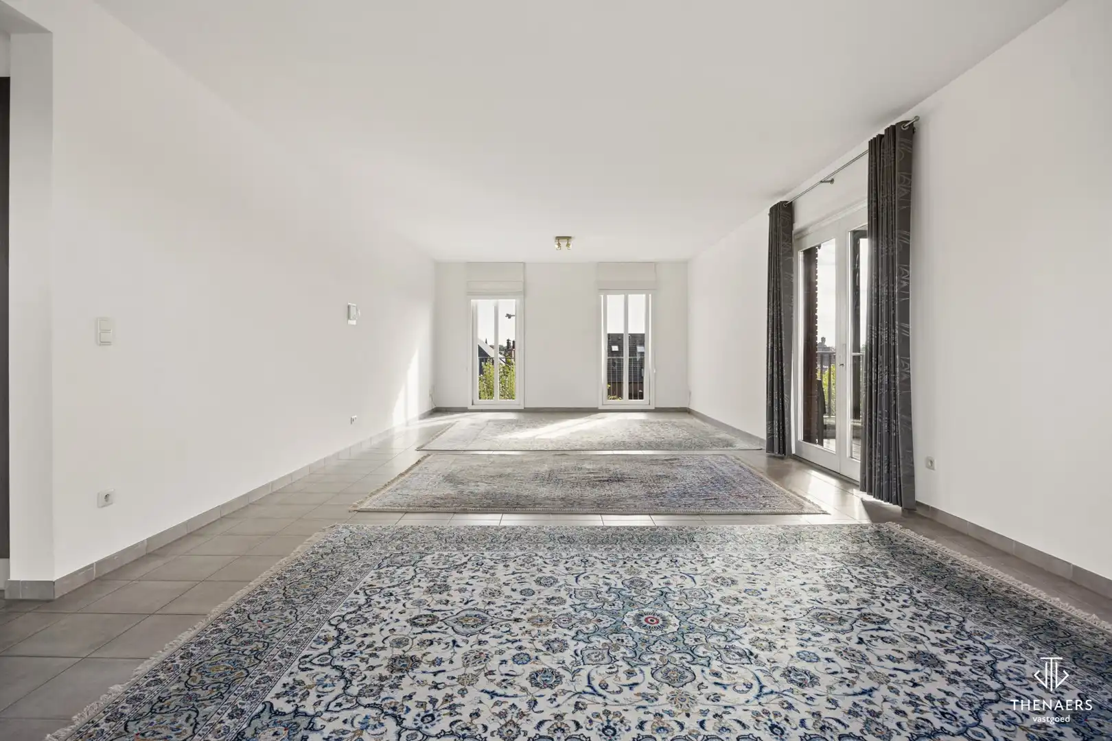 Ruim appartement van 166 m² met 2 terrassen en ondergrondse autostaanplaats in hartje Sint-Truiden. foto 2