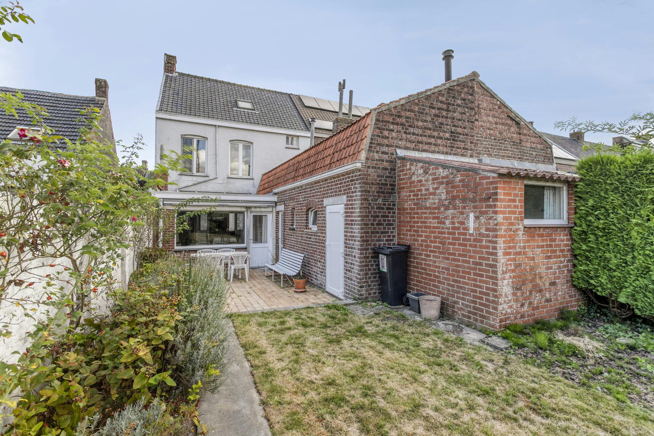 Karaktervol huis met zonnige tuin, 3 slaapkamers én garage met uitweg foto 16