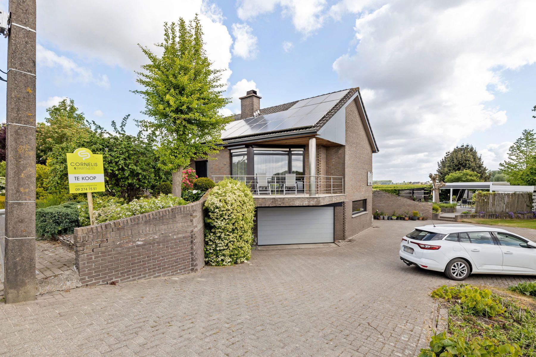 Open bebouwing met 360° landelijk zicht en 2 garages foto 4
