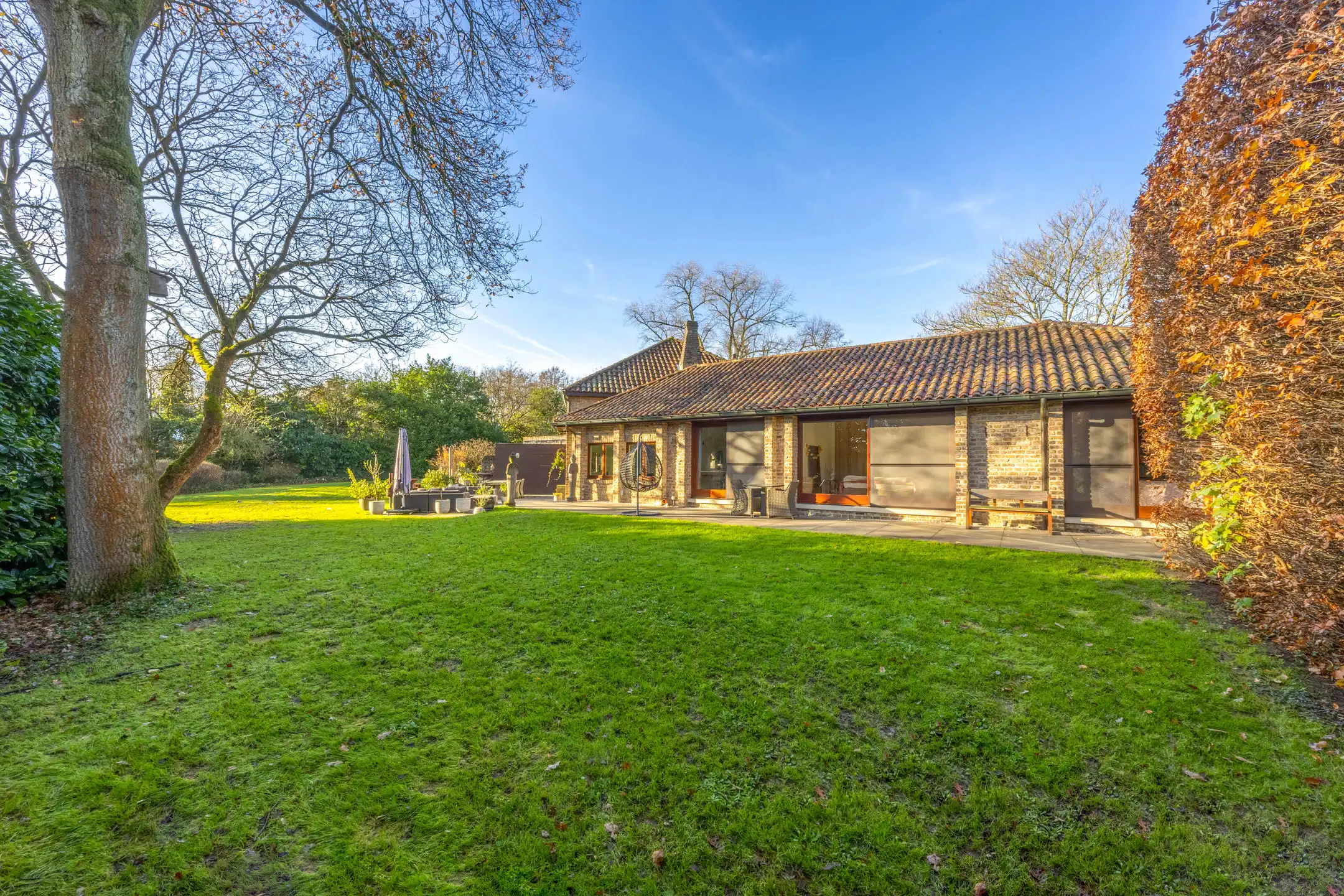 Unieke woning met prachtige tuin en veel privacy foto 23