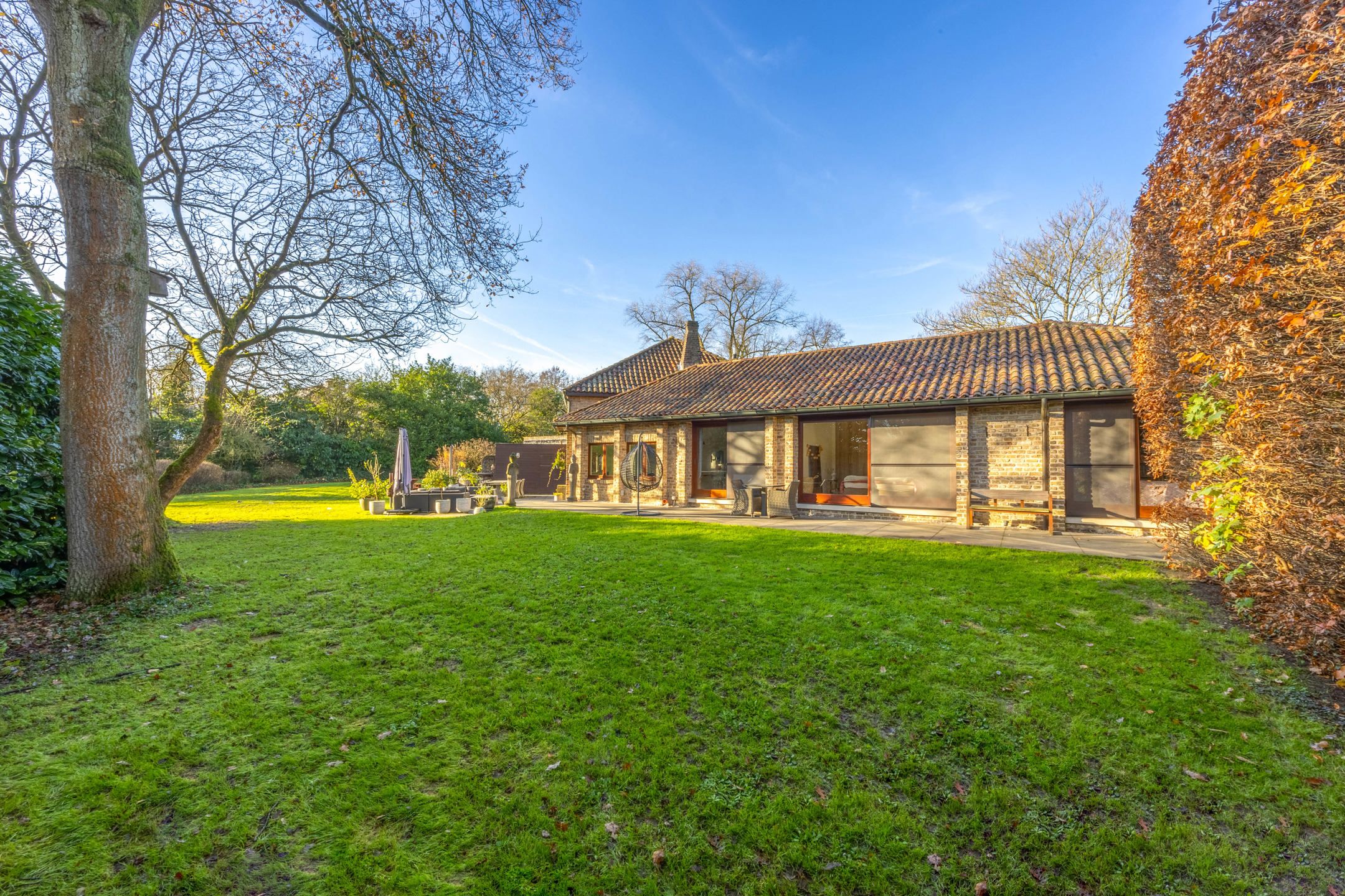 Unieke woning met prachtige tuin en veel privacy foto 23