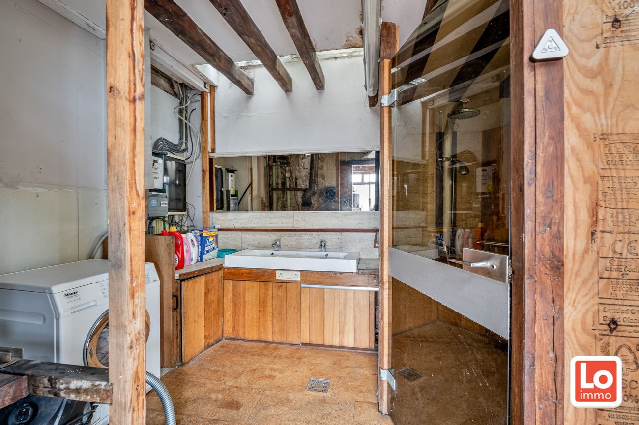 VERKOCHT!! Ruime alleenstaande volledig te renoveren woning met afzonderlijke garage op een makkelijk bereikbare locatie in Desteldonk. foto 25