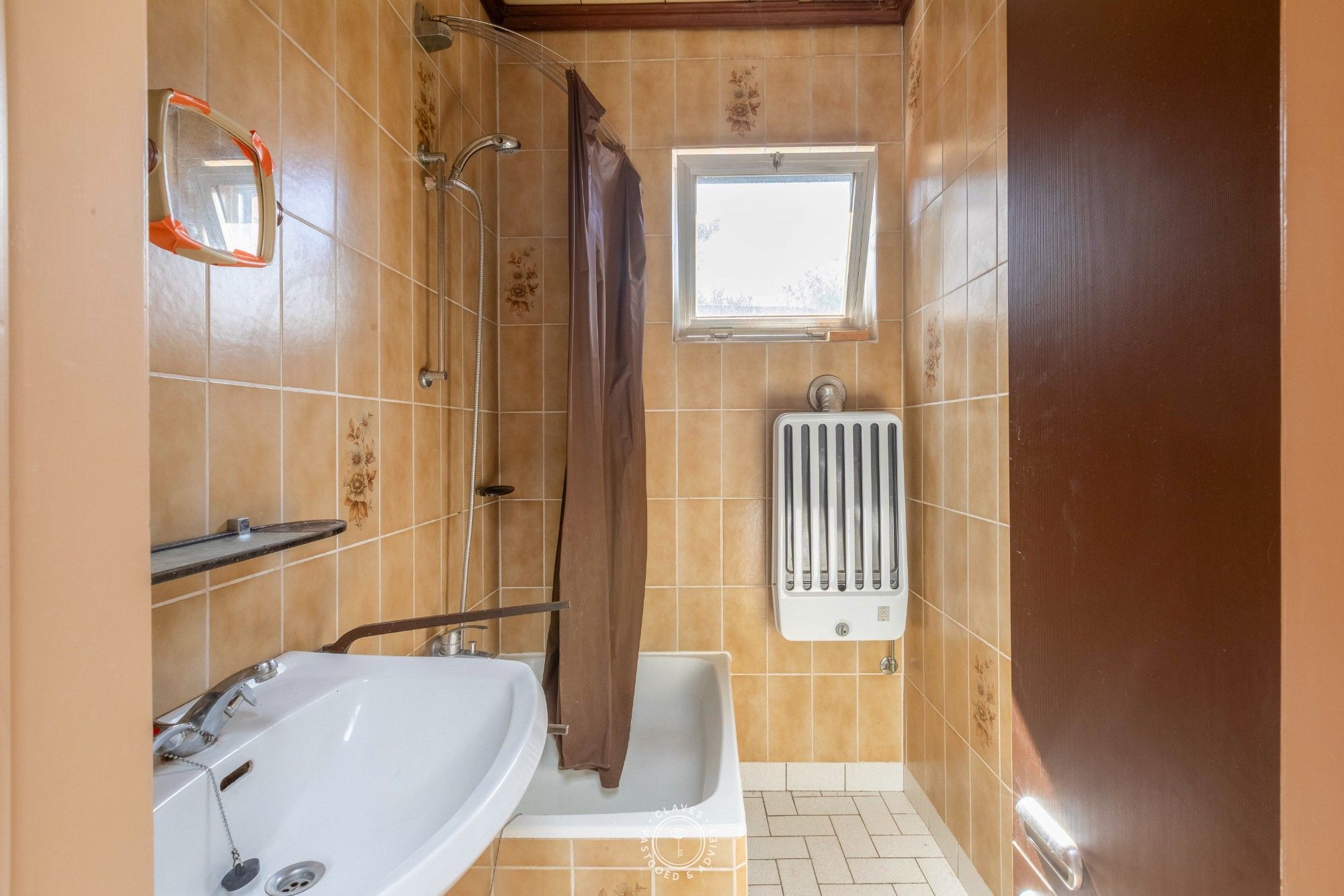 Betaalbare stadswoning met tuin en potentieel – ideaal renovatieproject foto 7