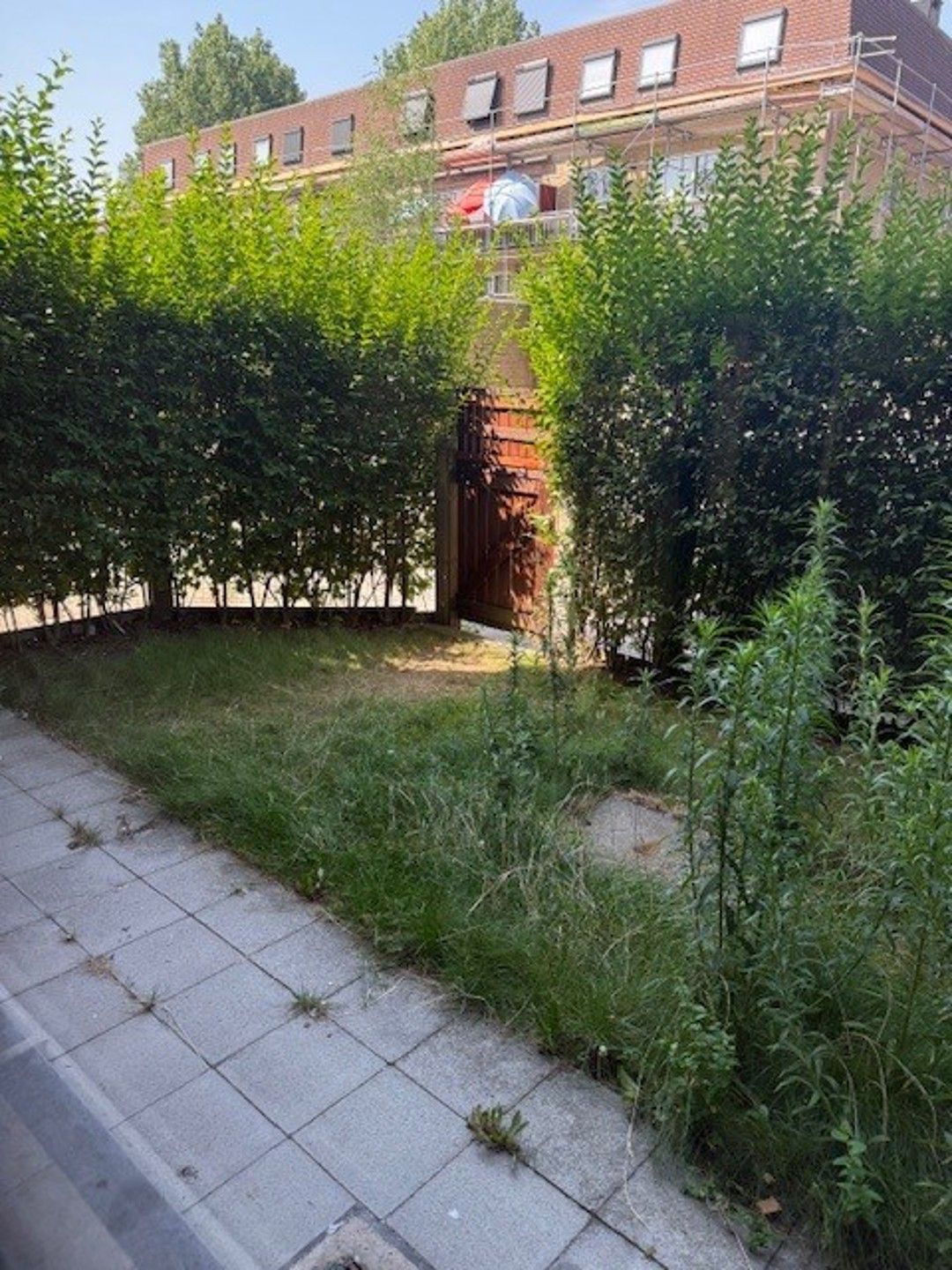 Deels gerenoveerd gelijkvloers appartement. foto 14