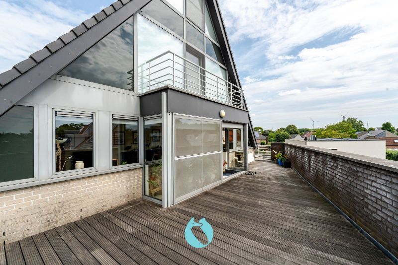 Dit prachtig en ruim appartement met één van de mooiste terrassen te Evergem is gelegen in de Kapellestraat foto 4