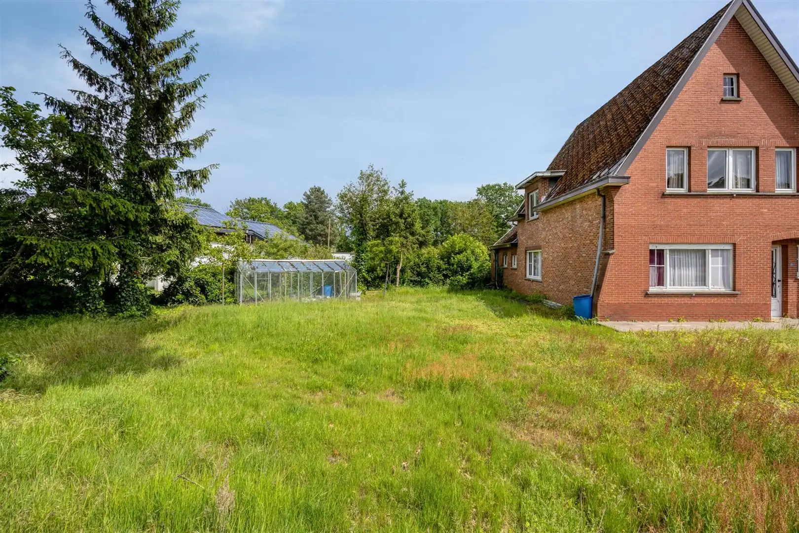 TE KOOP: Te renoveren woning met ruim perceel en projectmogelijkheden in Lummen! foto 24