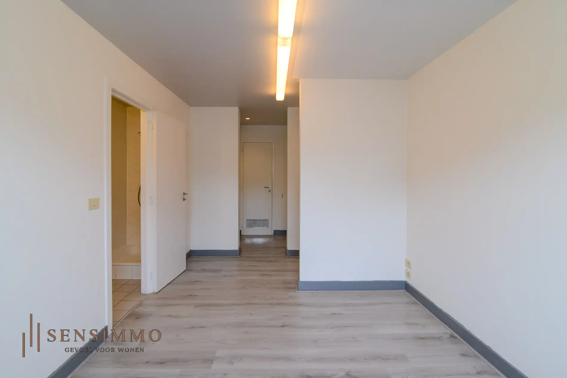 Commerciële handelspand met bovenliggend appartement in hartje Maasmechelen foto 19