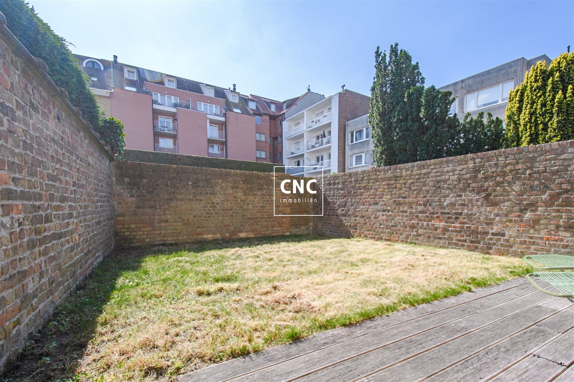 Gelijkvloers appartement met zonnige tuin nabij het centrum
 foto 11