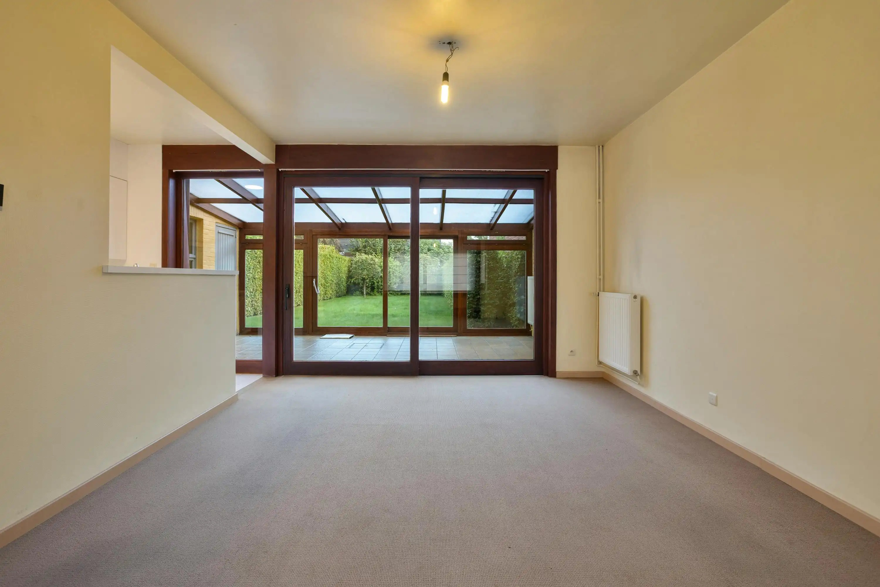 Instapklare halfopen woning met garage en tuin in Roeselare foto 4