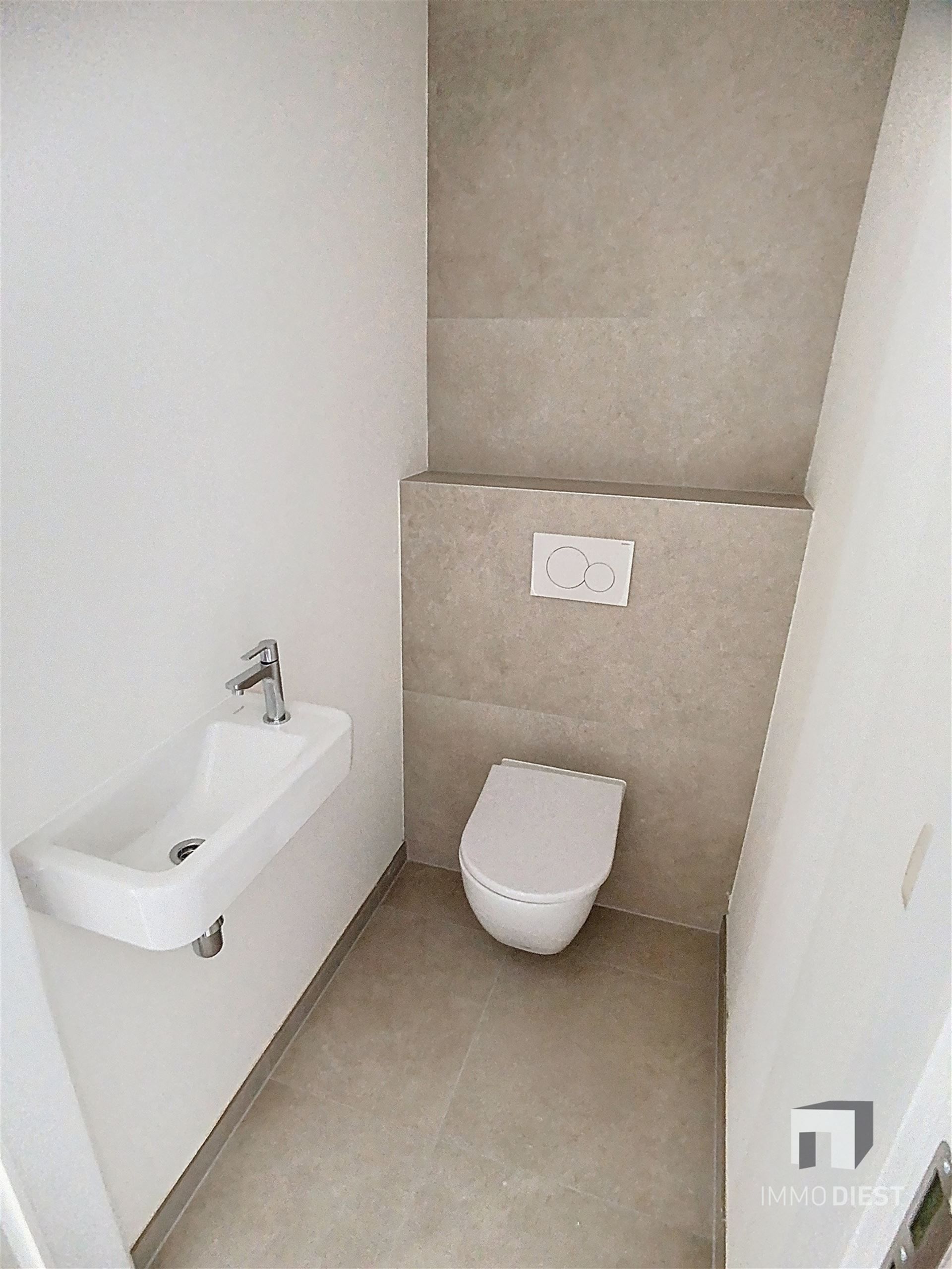 Gelijkvloers appartement met terras en tuintje foto 22