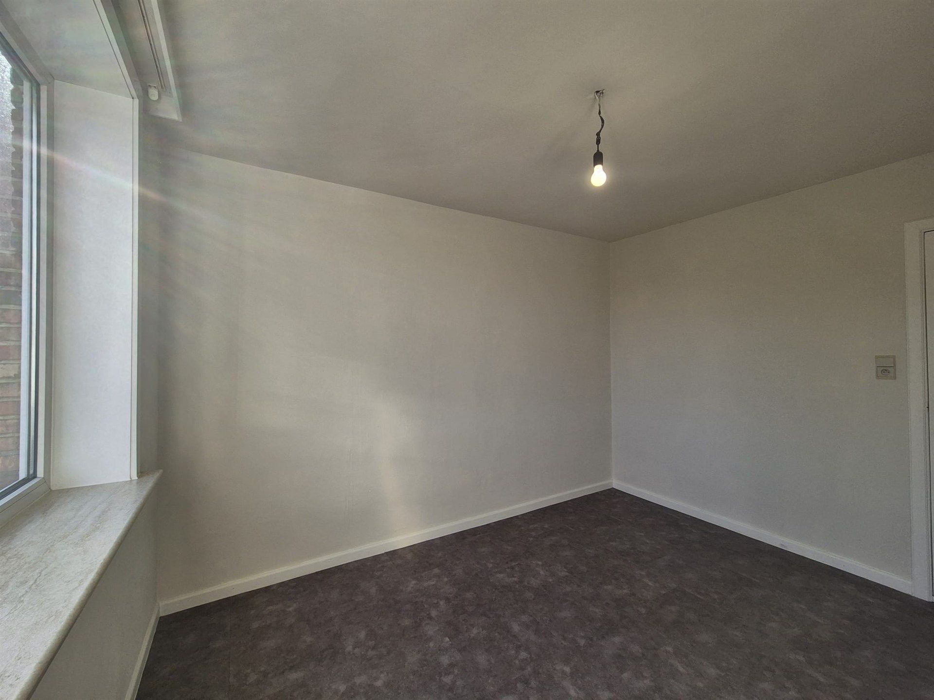 Knus appartement met 2 slaapkamers foto 11