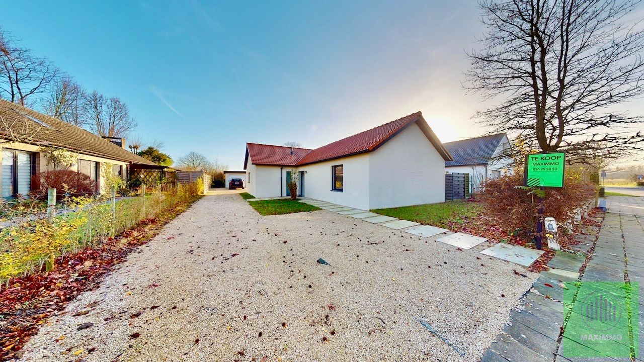 Instapklare, gerenoveerde gelijkvloerse villa te koop in Marke – Topligging nabij Kortrijk foto {{pictureIndex}}