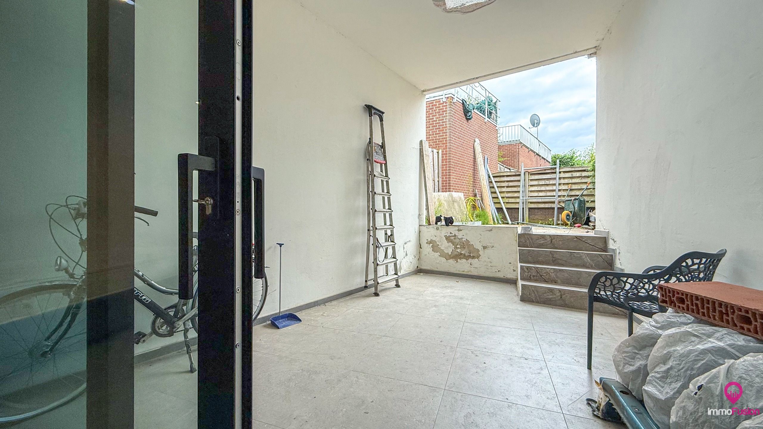 Gelijkvloers appartement met terras en kelder in hartje Zolder! foto 19