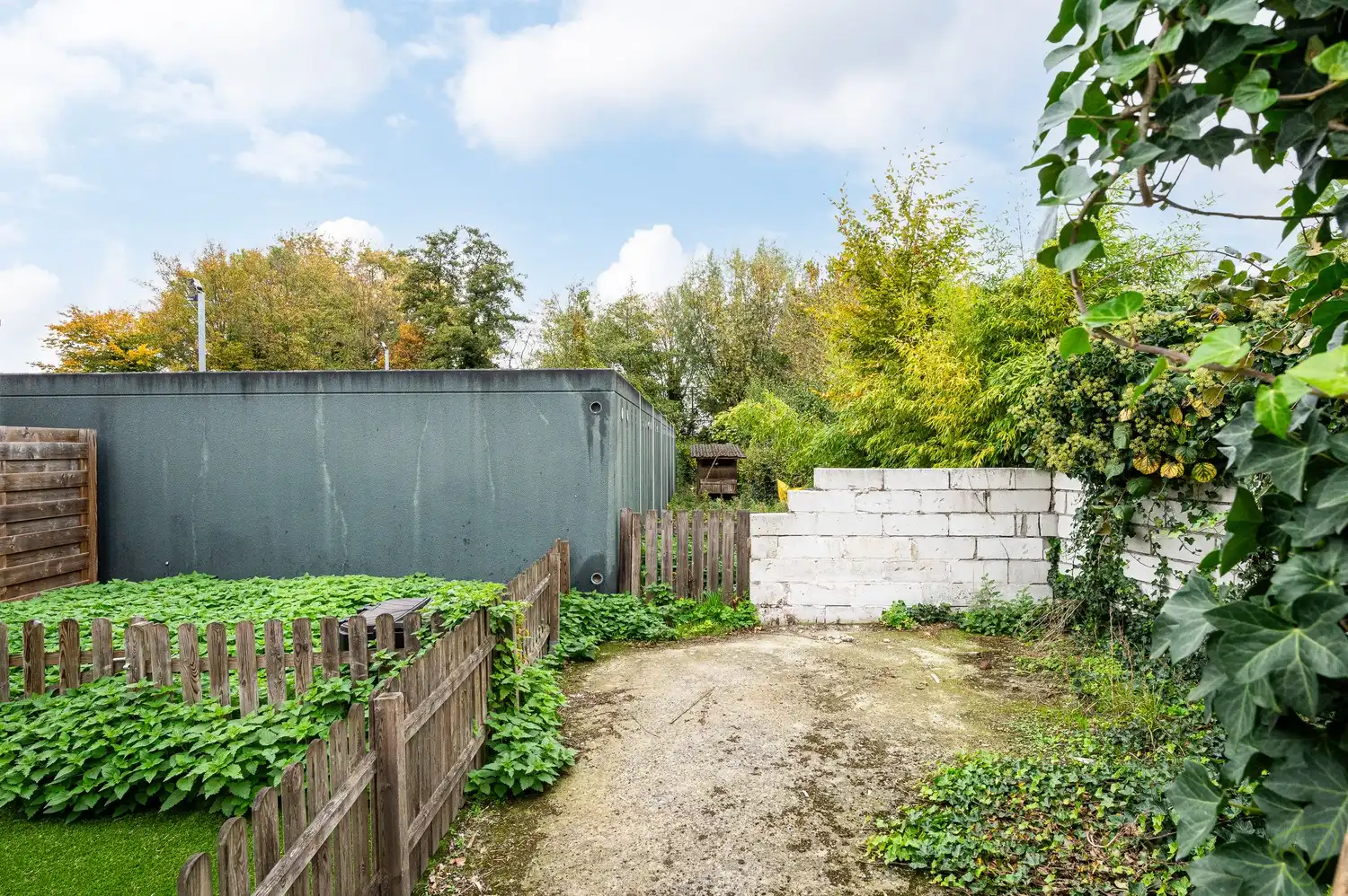 Statige handelswoning met ruime tuin in het centrum van Kaprijke foto 21