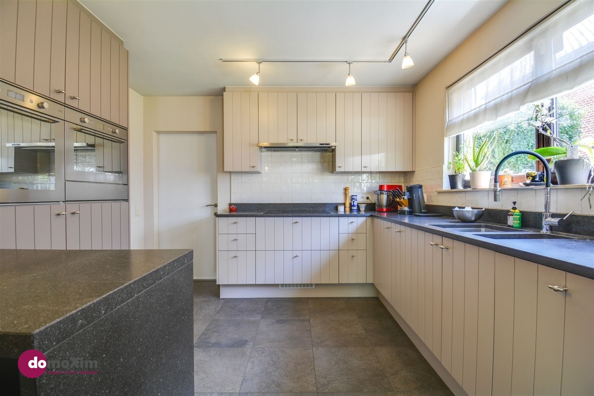 Instapklare woning met zonnige tuin vlak bij het centrum van Boortmeerbeek foto 9