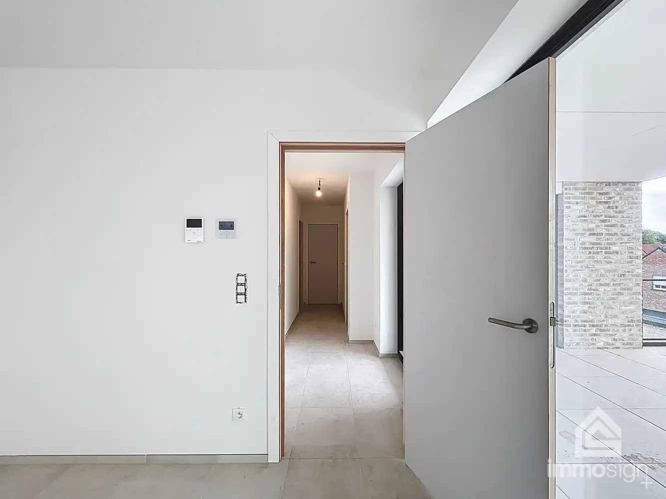 Instapklaar penthouse met 2 slaapkamers, ruim terras, 2 parkeerplaatsen en berging te Kinrooi foto 9