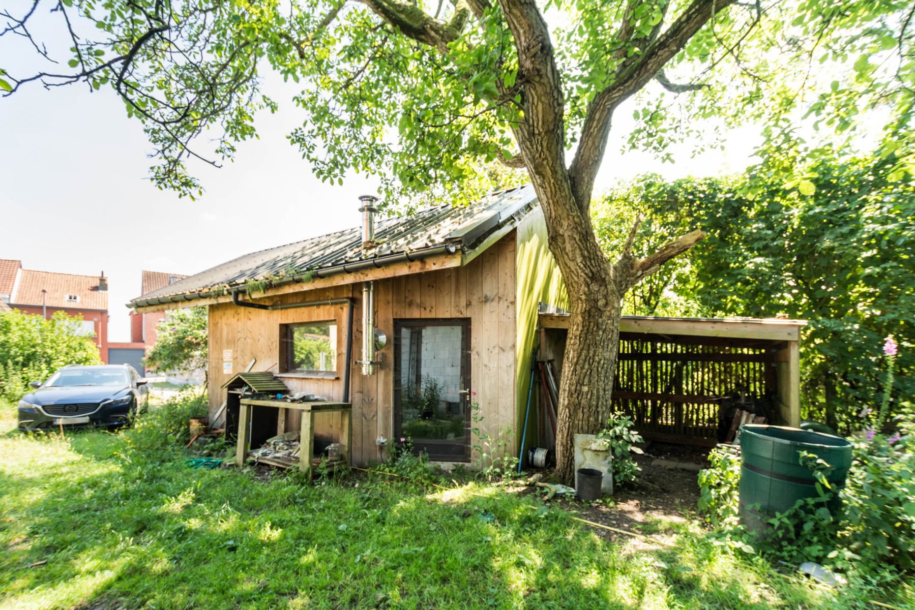 Een verder af te werken (deels ruwbouw) hoeve met grote tuin foto 5