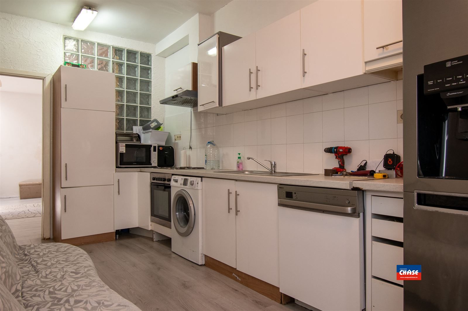 Ruime woning op toplocatie met 4 slaapkamers, 3 keukens en 3 badkamers foto 7