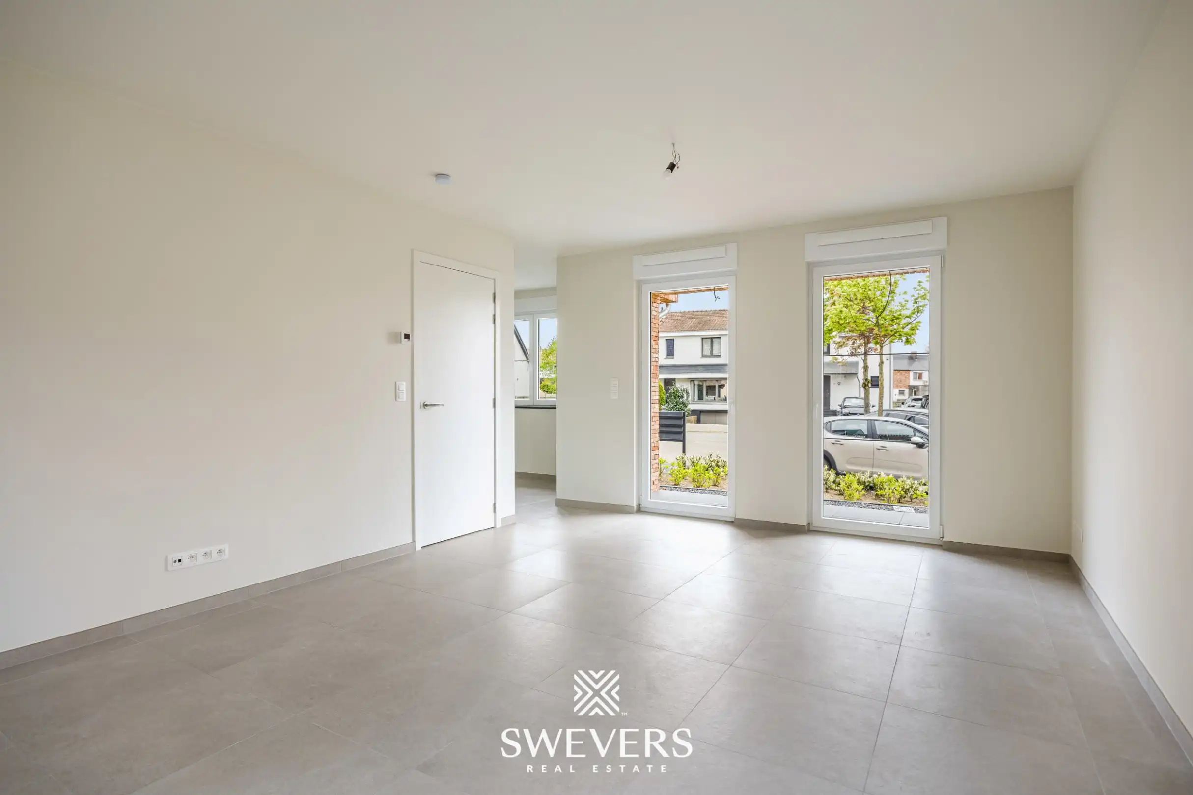 Modern gelijkvloers appartement met privétuin en dubbele parking foto 2