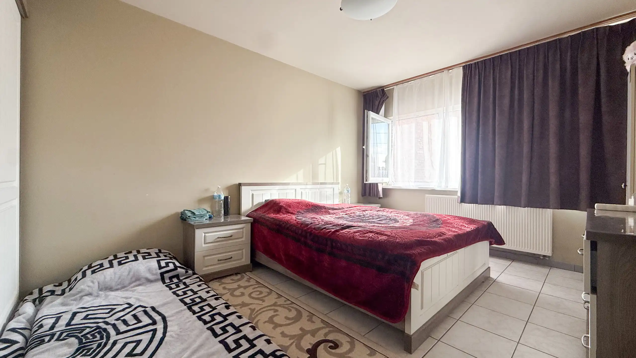 Gelijkvloers appartement met 2 slpk en privé buitenruimte! foto 12
