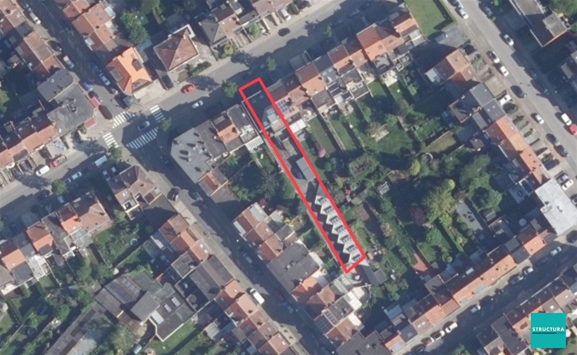 Opbrengsteigendom met 2 appartementen en 7 garageboxen foto 4